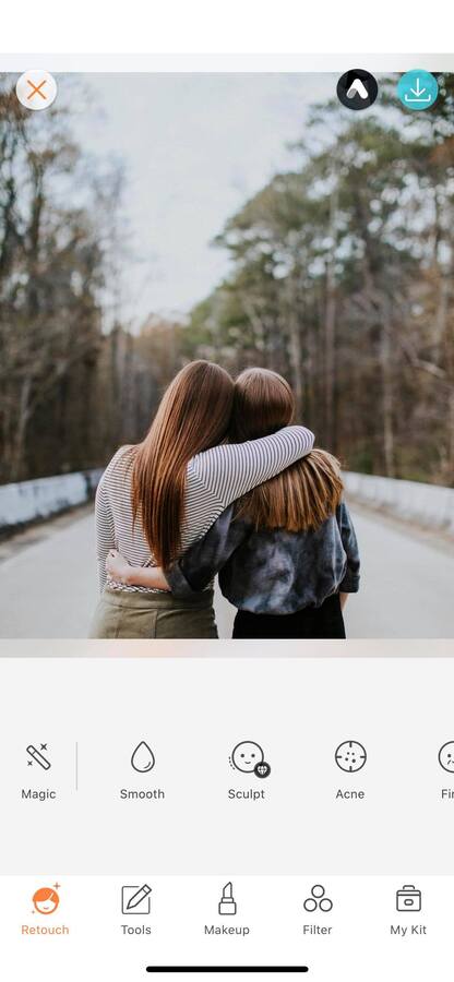 the backs of two women hugging