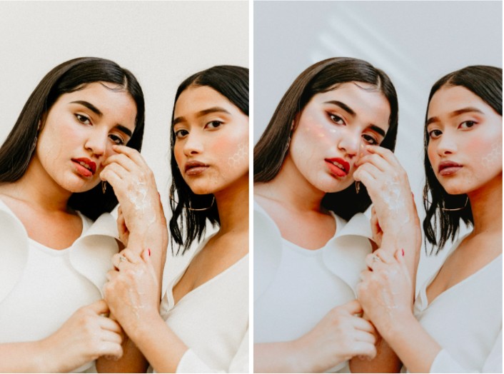 dos amigas con maquillaje, vestidas de blanco 